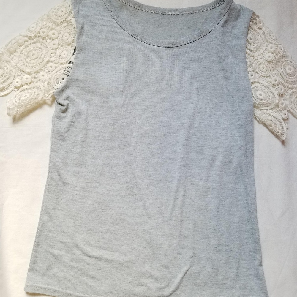 Boutique laced sleeve top